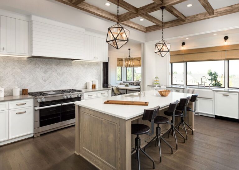 Modern kitchen renovation in Vancouver featuring custom cabinetry, island, and contemporary design